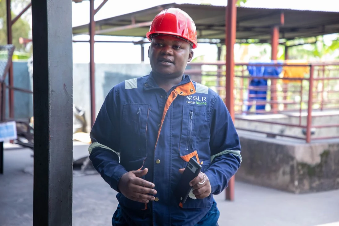 Mining professional wearing a hard hat and high-visibility workwear